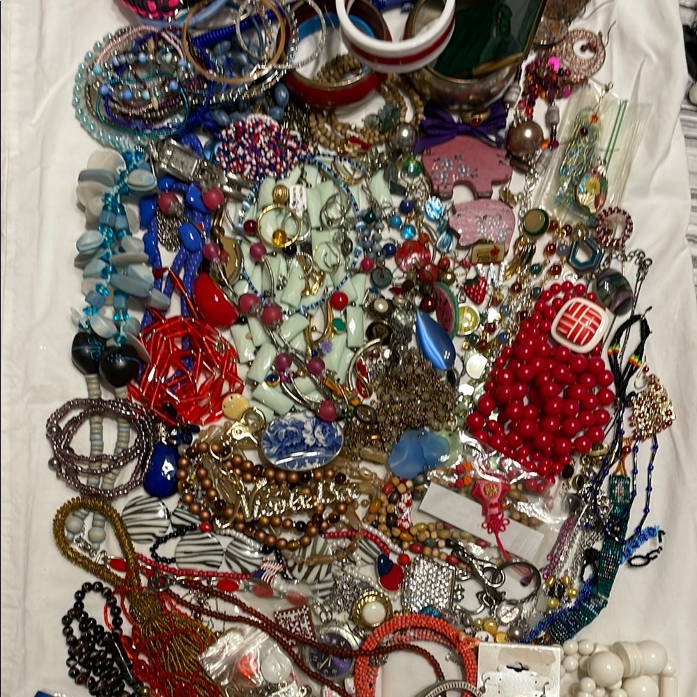 Gallon bag of Colorful Assorted Junk Drawer Jewelry for crafting or repurposing.